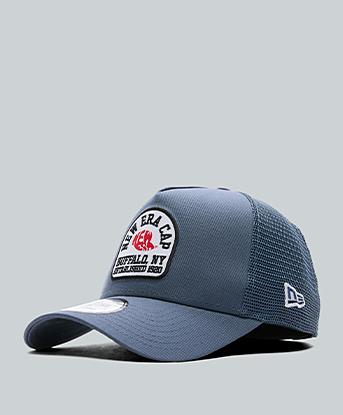 New Era Patch Trucker Cap in Muted Indigo