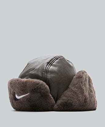 Nike Faux Leather Flying Trapper Cap in Ironstone / Milk / White