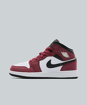Jordan Junior Air Jordan 1 Mid SE Trainer in Team Red / White / Black / Dark Team Red