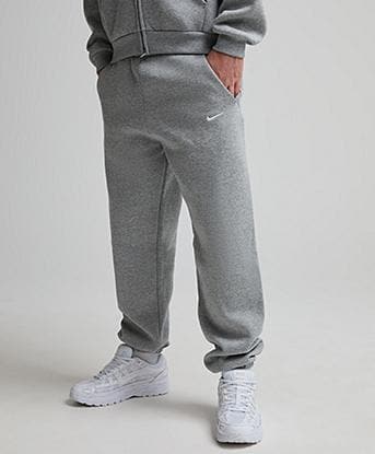 Nike Junior Solo Swoosh Fleece Jogger in Dark Grey Heather / Sail
