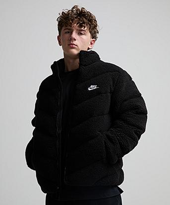 Nike Junior Therma Fit Borg Puffer Jacket in Black / White